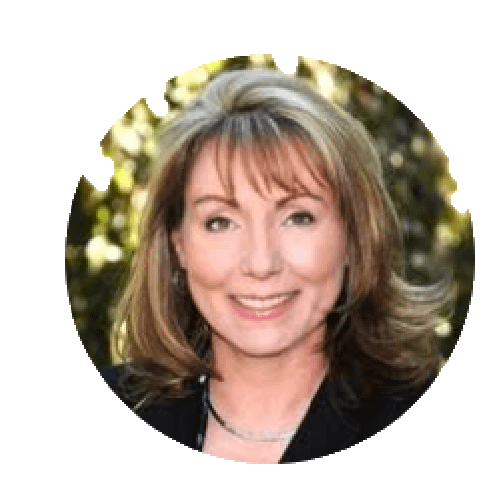 Headshot of Kim Taylor with blonde hair and navy blazer